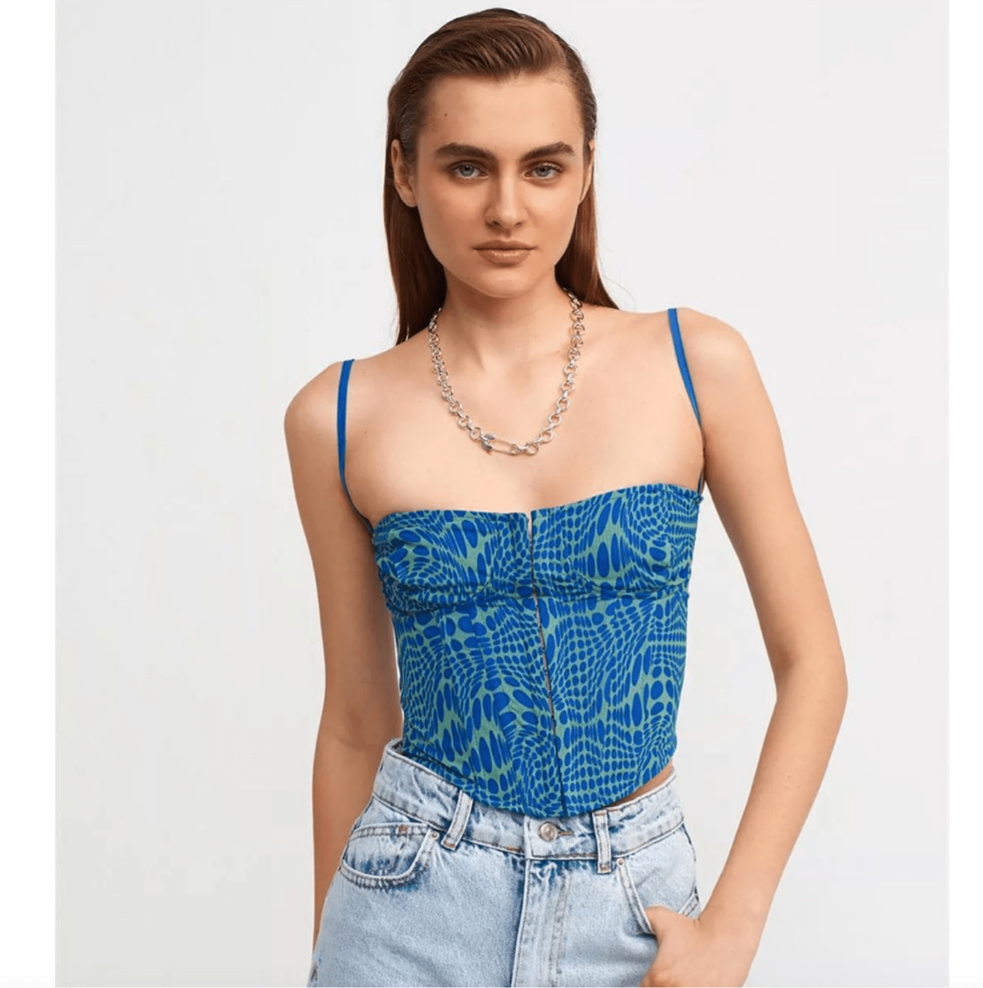 Blue and green printed corset top with thin straps from Chez Neeba.