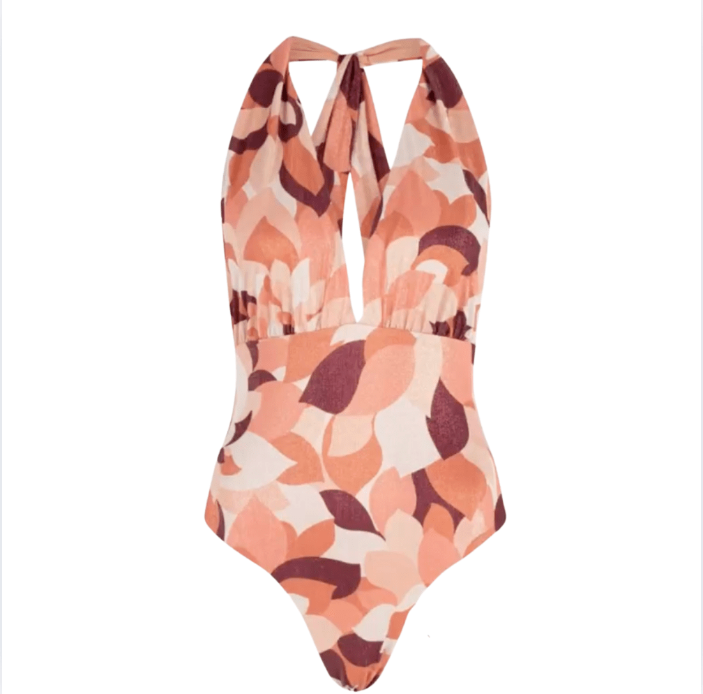 Printed halter one-piece swimsuit in peach and brown tones by Chez Neeba.