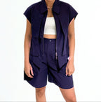 The Ink Utility Set by Chez Neeba — navy two-piece with sleeveless vest and matching tailored shorts, limited edition women’s fashion from Dubai.