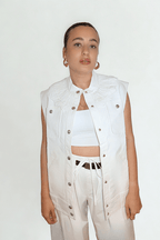 Laced Authority Vest by Chez Neeba — white vest featuring a knitted collar and lace-up design, combining clean minimalism with contemporary sophistication for an effortlessly chic look.