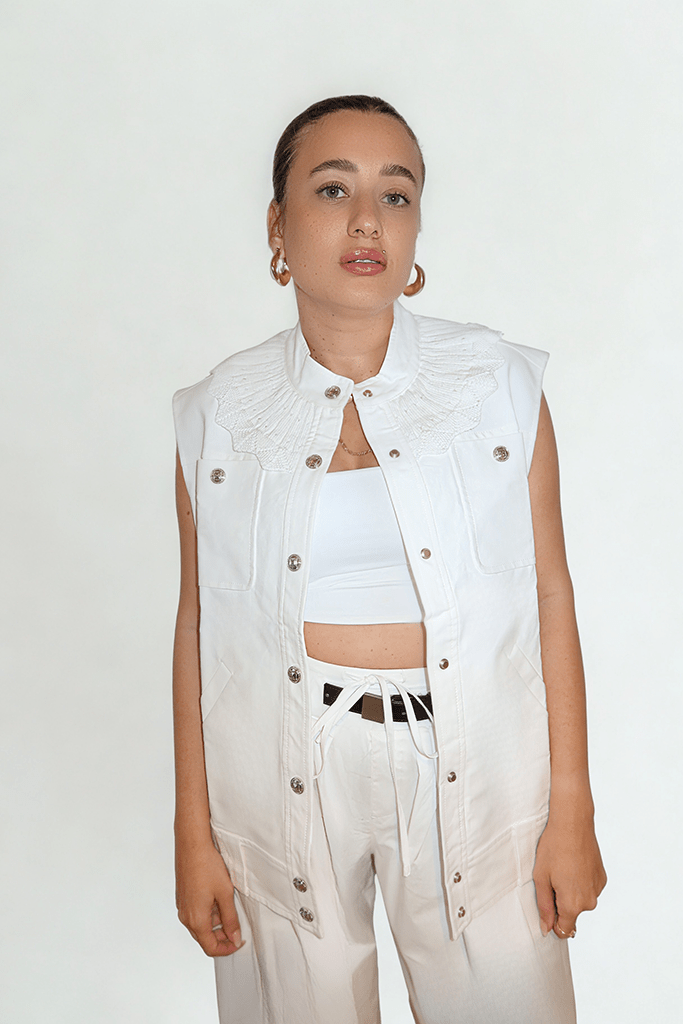 Laced Authority Vest by Chez Neeba — white vest featuring a knitted collar and lace-up design, combining clean minimalism with contemporary sophistication for an effortlessly chic look.