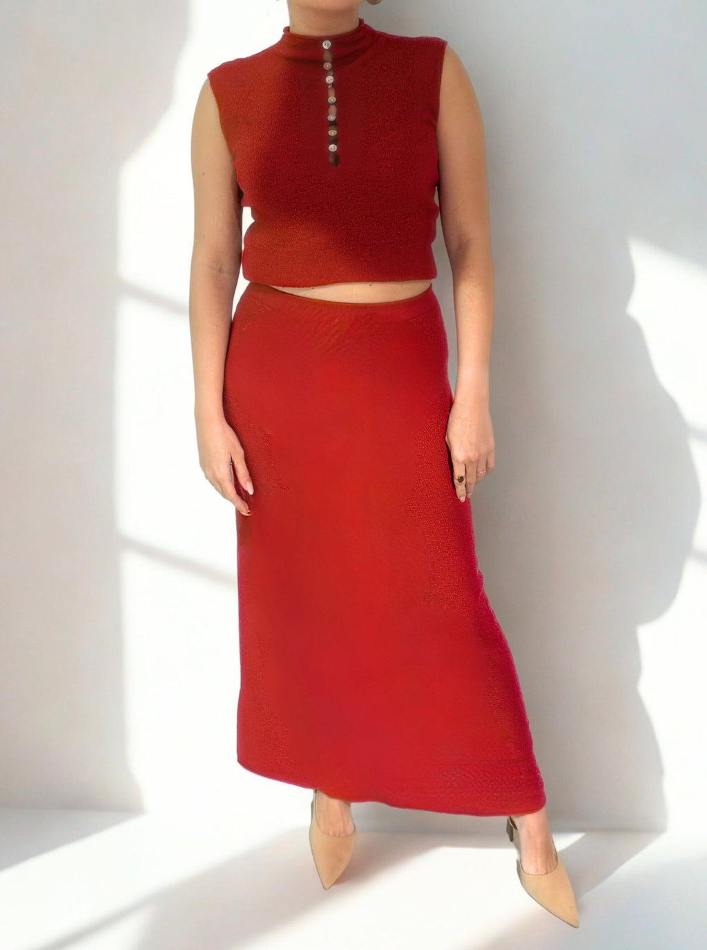 Love Bloom Set by Chez Neeba — red knit textured two-piece set designed to highlight feminine elegance with a bold, modern silhouette and soft, form-flattering fabric.