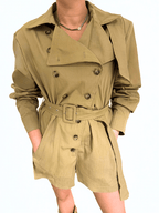 The Sahara Trench Romper by Chez Neeba — beige short trench-style romper with button closure and belt detail, limited edition women’s fashion from Dubai.