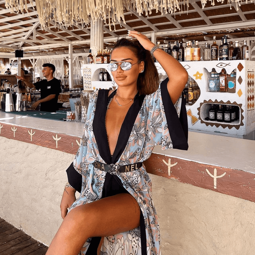 Pastel floral& butterfly kimono with black trim from Chez Neeba.