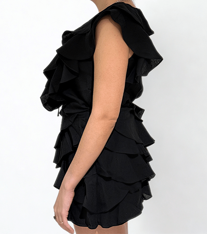 The Cascade Ruffle Mini Set in black by Chez Neeba — sleeveless ruffle top and matching mini skirt, limited edition women’s fashion from Dubai.