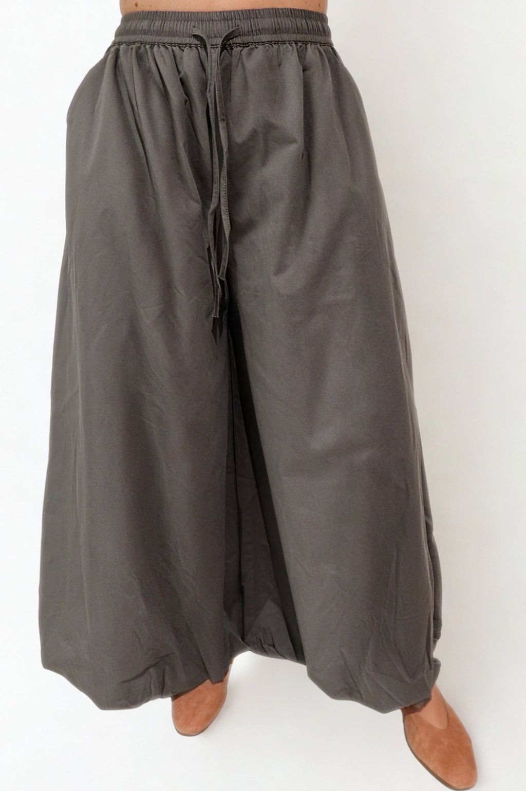 Wide-leg flowy pants by Chez Neeba, soft lightweight fabric, limited edition women’s fashion from Dubai.