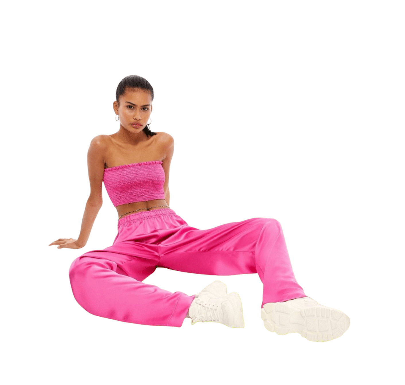 Model wearing fuchsia satin lounge set from Chez Neeba – bandeau top and relaxed pants.