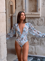 Pastel floral long-sleeve chiffon swimsuit with deep V neckline from Chez Neeba.