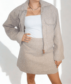 The Sandstone Wool Set by Chez Neeba — beige wool two-piece with cropped jacket and mini skirt, limited edition women’s fashion from Dubai.