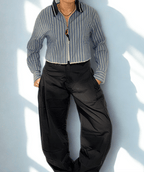 The Sculpted Cargo by Chez Neeba — wide-leg cargo denim pants in navy and gray, designed for a flattering structured fit, limited edition Dubai fashion.