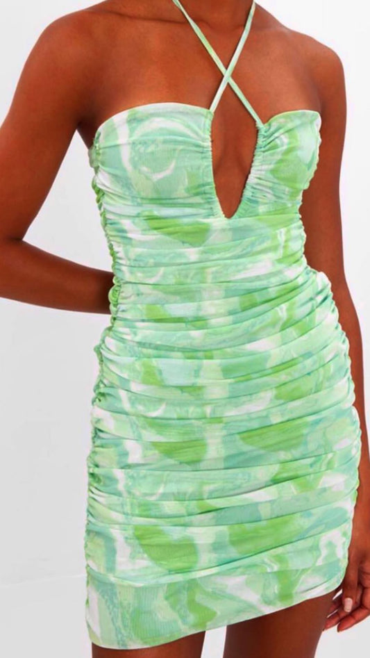 Green ruched halter mini dress with marble print and cross straps from Chez Neeba.