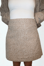 a beige wool two-piece by Chez Neeba. A limited edition design blending structure, warmth, and quiet luxury in Dubai.